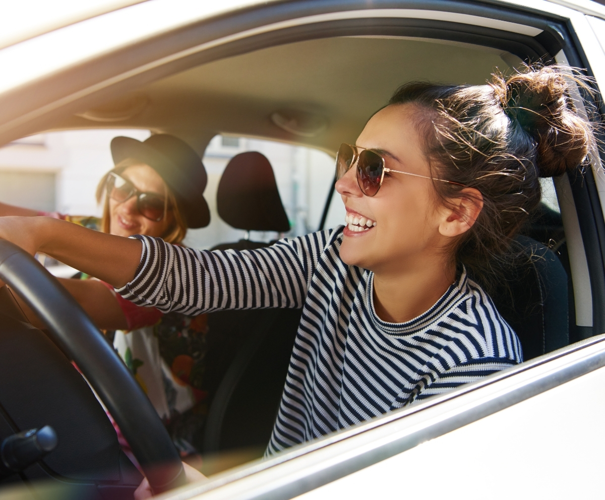 Friends enjoying a drive with added vehicle repair protection
